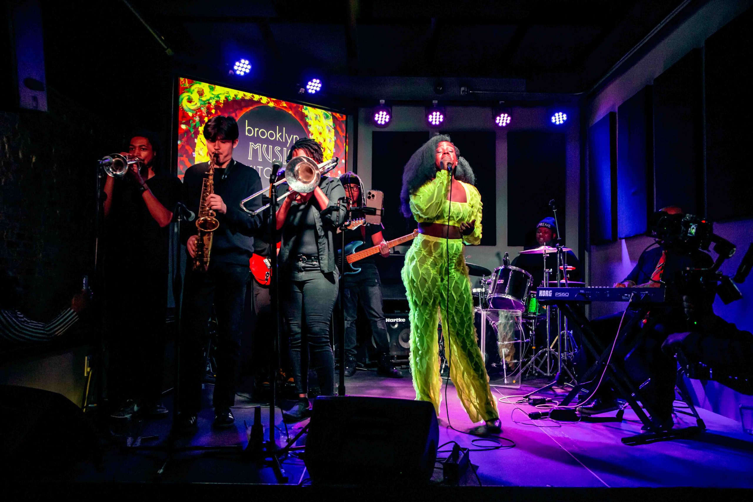 Trinity performing for a live audience